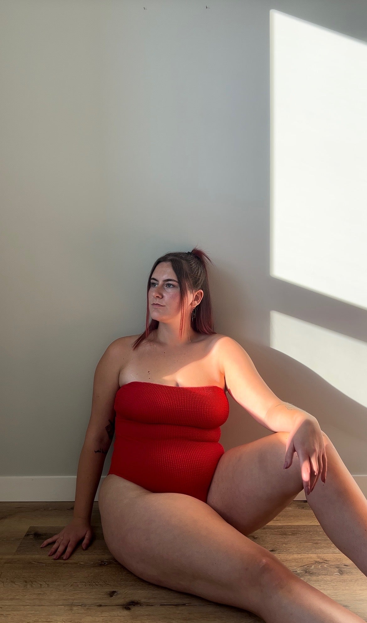 Square neck textured crinkle one piece with the straps removed in chili / red