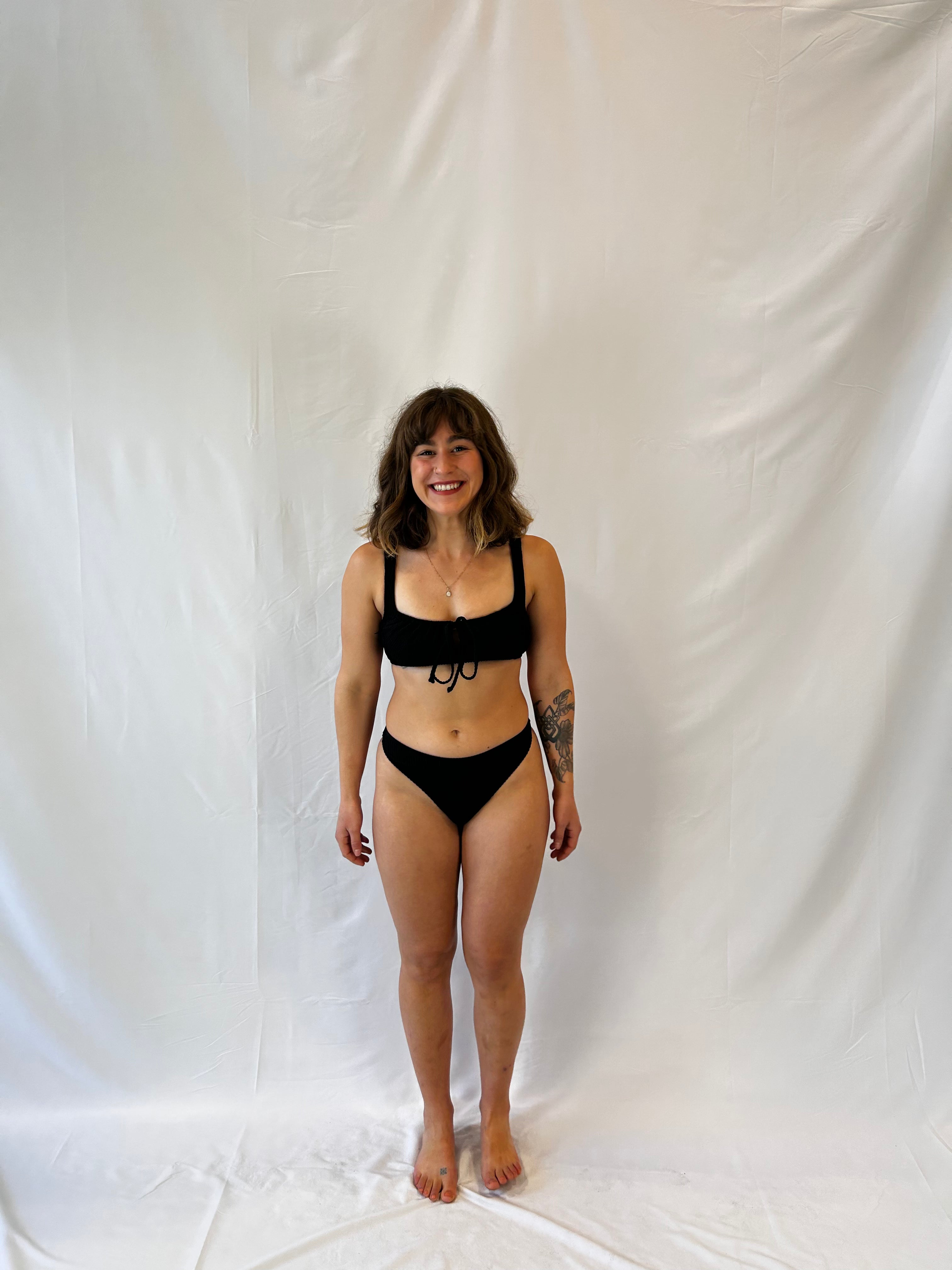 Model represents size S in the black two piece bikini.