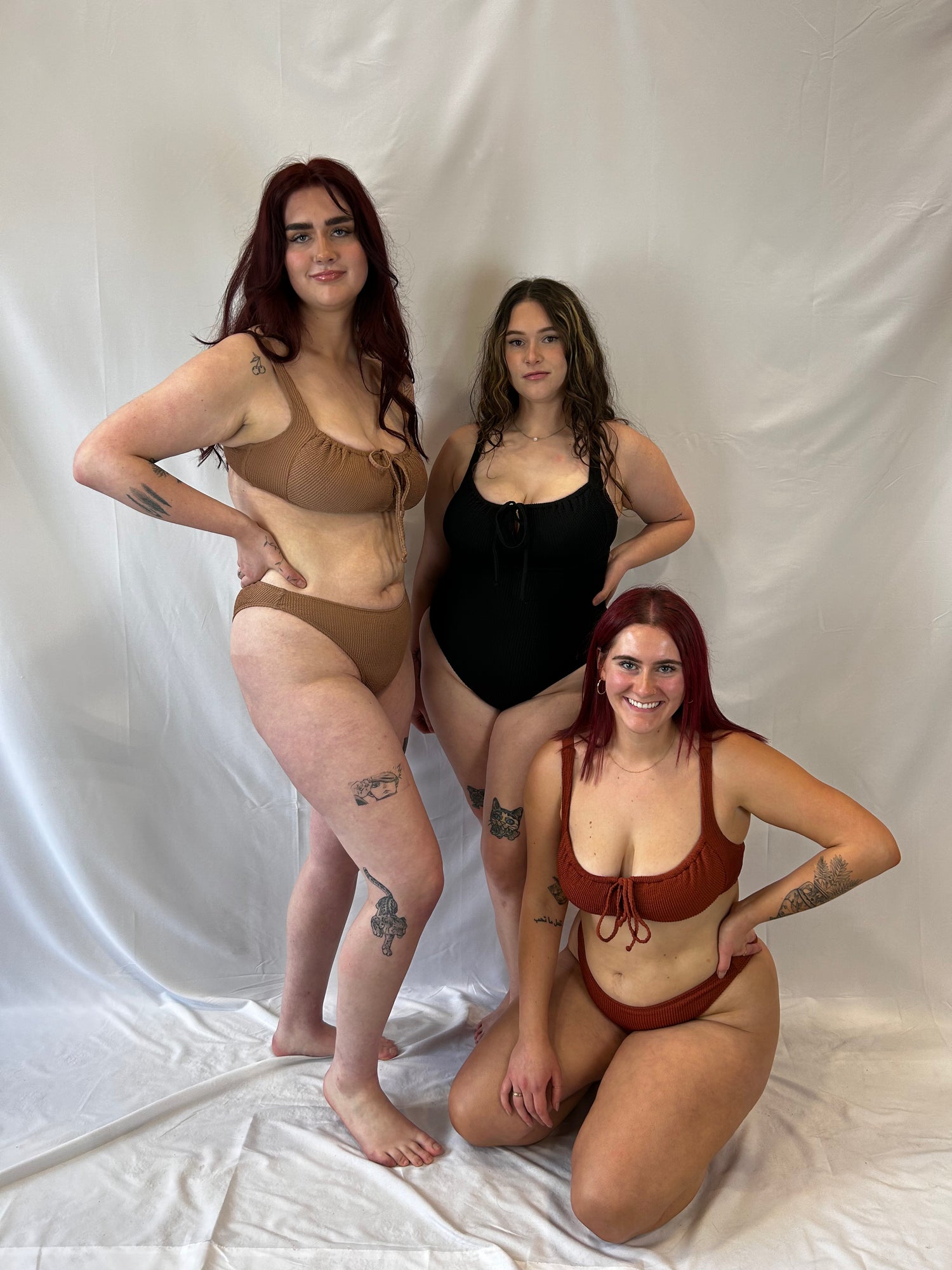 Three models representing sizes XL and XXL.